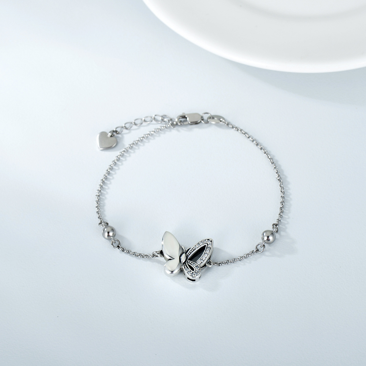 Pulsera urna para cenizas de plata de ley con circonita cúbica redonda y mariposa-4