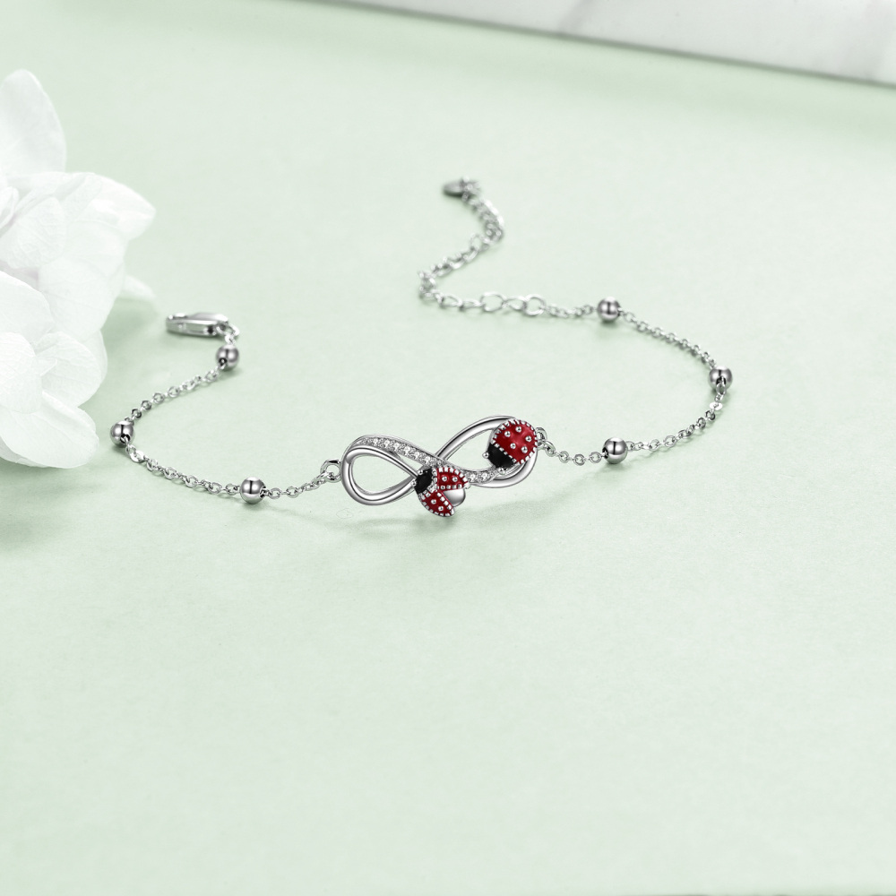 Sterling Silver Round Cubic Zirconia Ladybug & Infinity Symbol Charm Bracelet-4