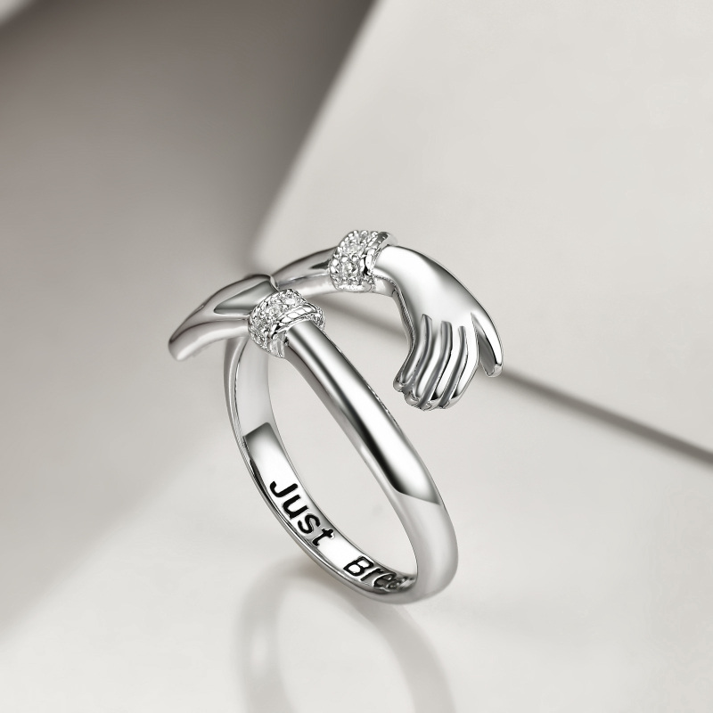 Anillo abierto de plata de ley con circonita redonda y manos abiertas-4