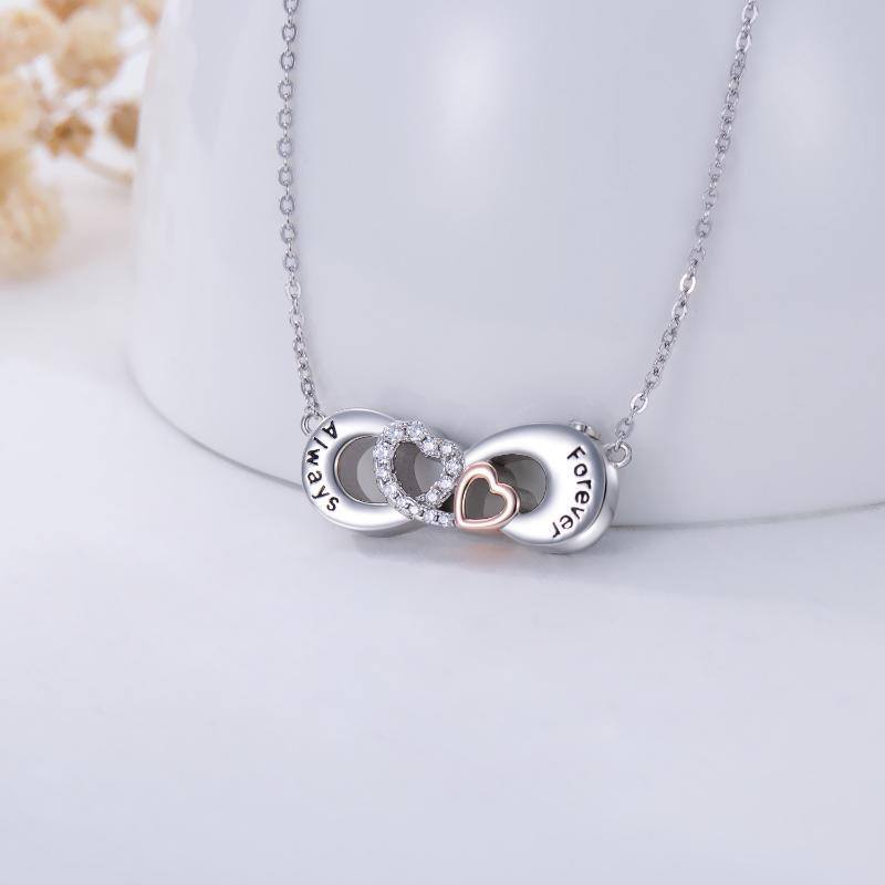 Plata de ley de dos tonos en forma circular Cubic Zirconia Corazón y Infinito Símbolo Urna-3