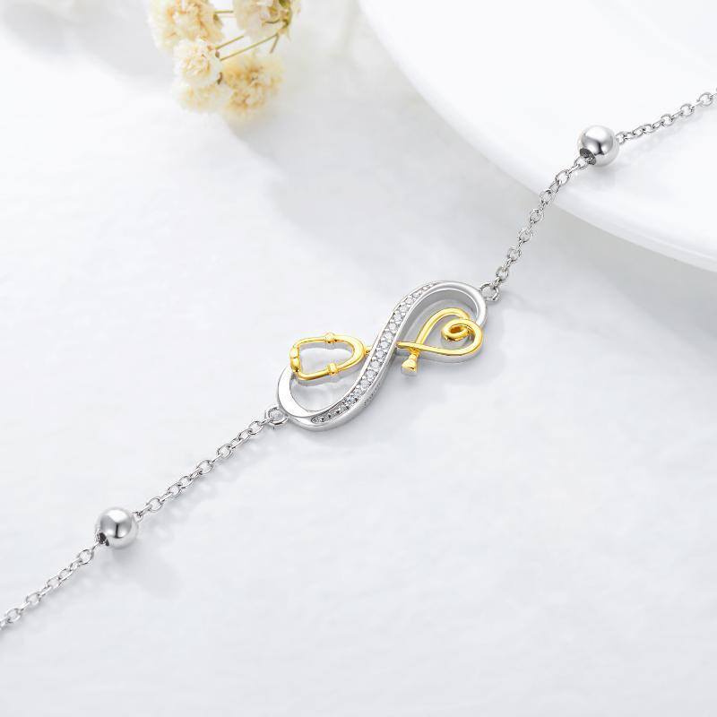 Sterling Silver Two-tone Circular Shaped Cubic Zirconia Infinity Symbol & Stethoscope Pendant Bracelet-4