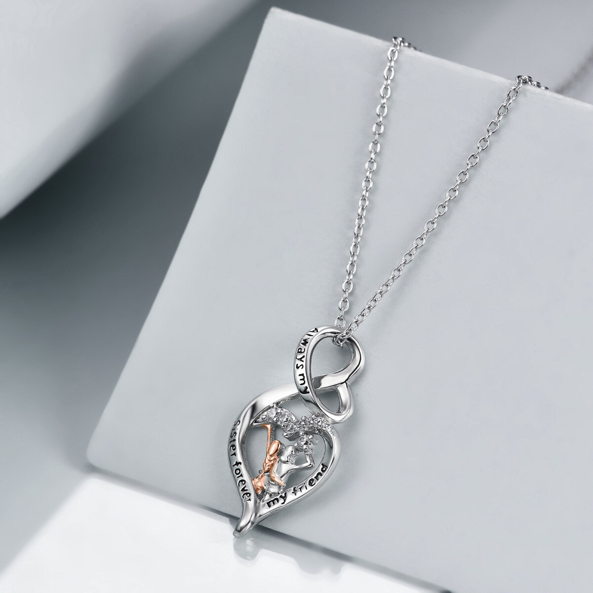 Collar con colgante de símbolo de infinito y corazón de circonita cúbica circular de dos tonos de plata de ley con palabra grabada para hermana-4