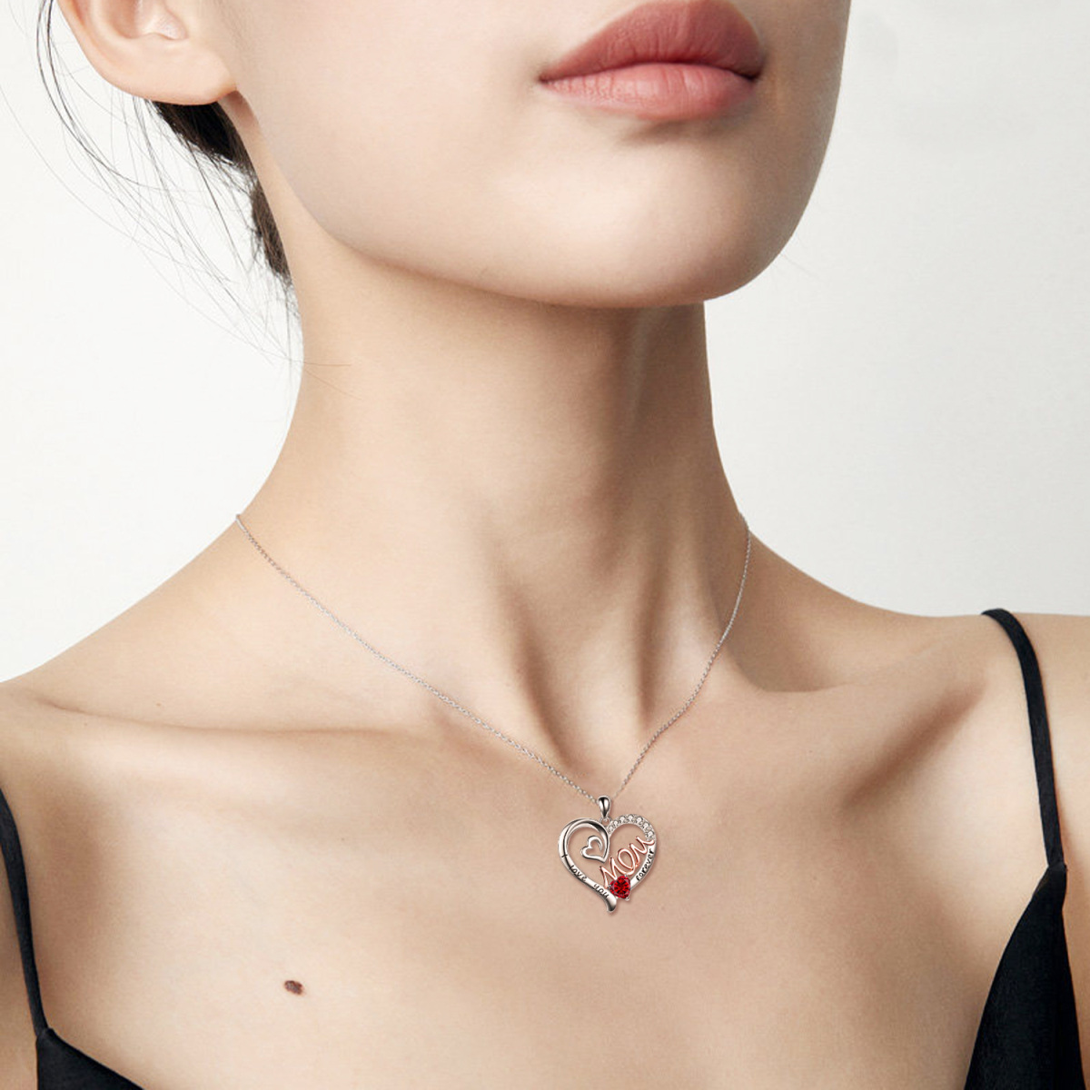 Collana con pendente a cuore in argento sterling con zirconi cubici con parola incisa-2