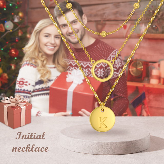 Collana in argento 925 placcato oro giallo con cerchio a strati e iniziale K-6