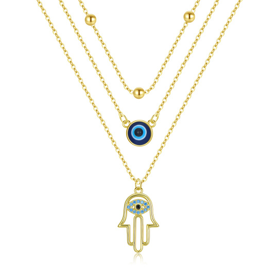 Collier en argent sterling et plaqué or jaune avec œil maléfique et hamsa superposés à la