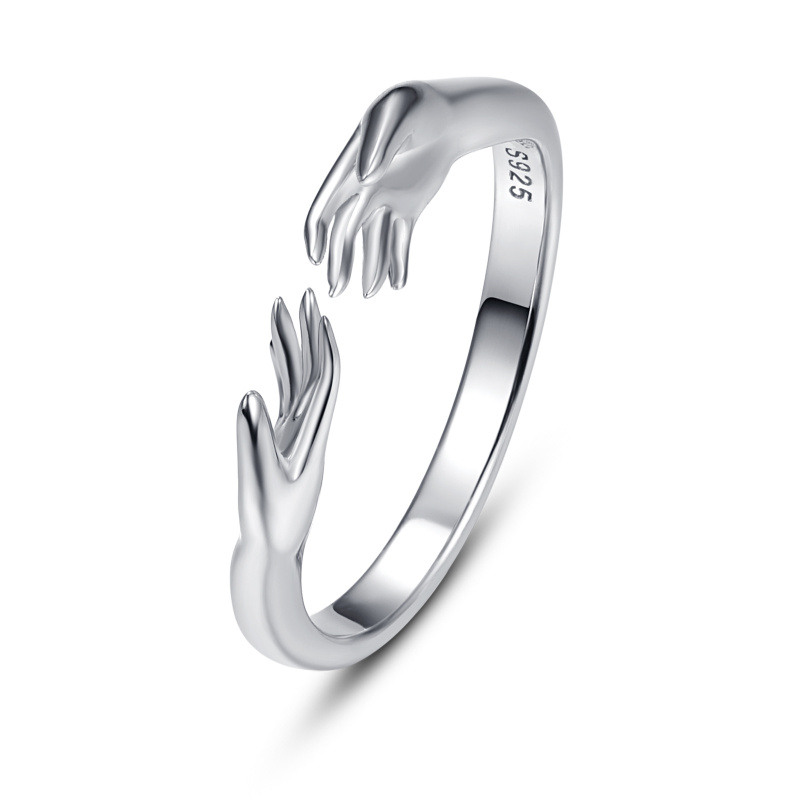 Anillo abierto con las manos en plata de ley-1