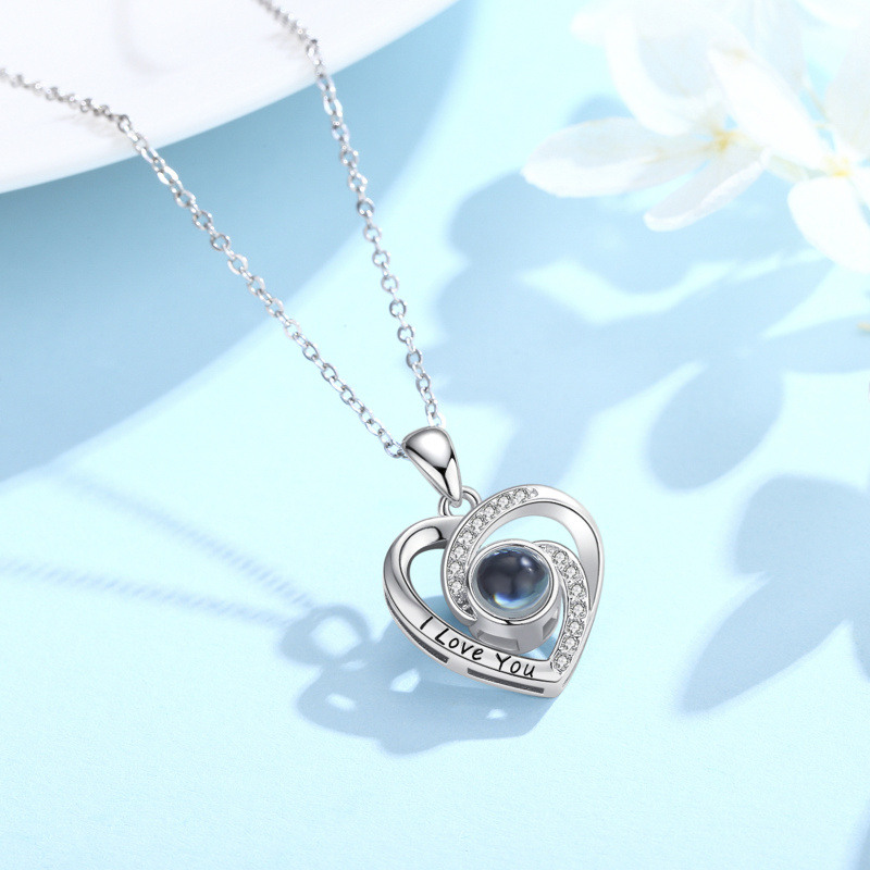 Collar con colgante de corazón con piedra de proyección en plata de ley con la frase 