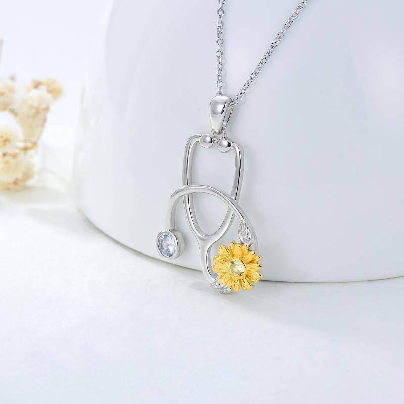 Collar con colgante de estetoscopio con forma de girasol y circonita cúbica transparente de dos tonos en plata de ley-3
