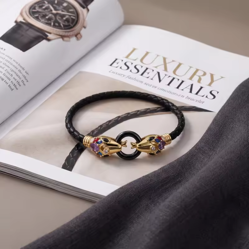 Pulsera con dije de dos cabezas de serpiente, de plata de ley con baño de oro amarillo y circonitas cúbicas.-5