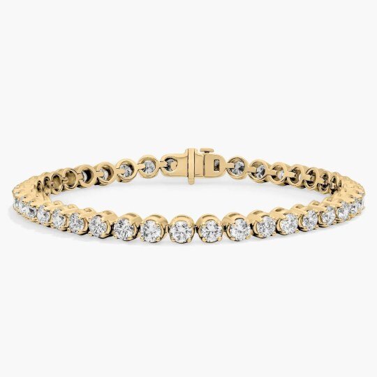 Pulsera de tenis de plata esterlina chapada en oro amarillo con moissanita